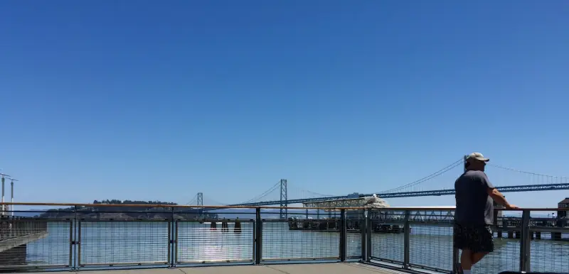 By the pier.