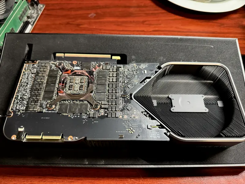 Graphics card with its cooler removed.