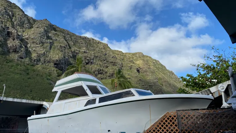 Mountains behind the boat.