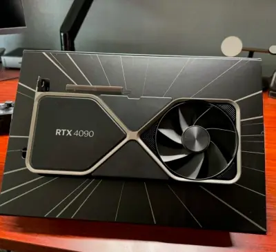 RTX 4090 graphics card beside its box.