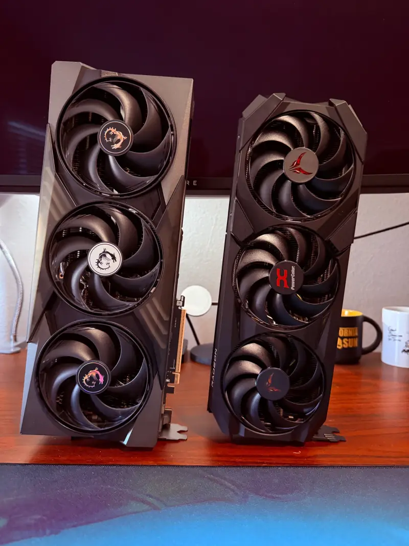 Two triple-fan graphics cards.