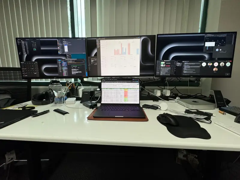 My workstation with laptop and external displays.
