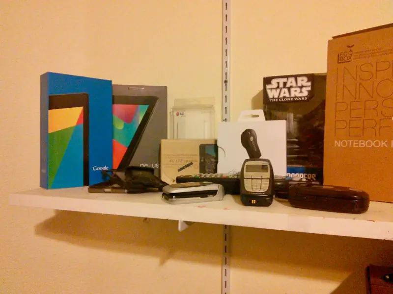 My device boxes and books on the shelf.