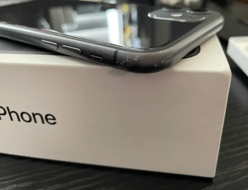 iPhone 12 in its case.